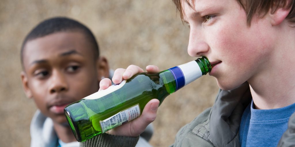 Teenagers drinking beer